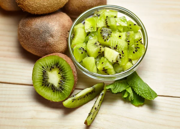 Healthy food. Tropical fruit. Whole and sliced kiwi. Kiwi fruit.