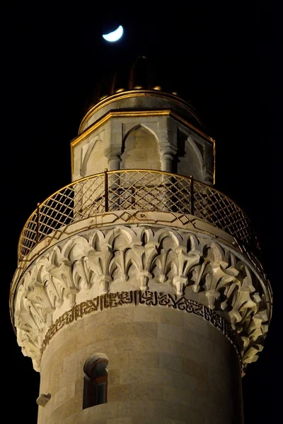 Minaret and moon in Baku, capital of Azerbaijan