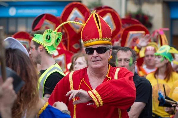 Man dressed as cardinal at Bath Carnival