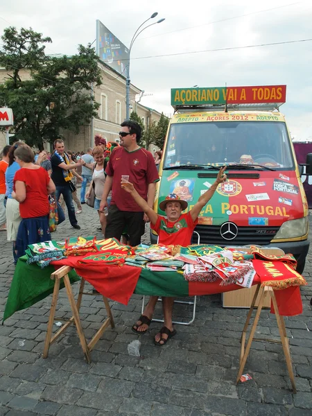 A devotee Portuguese fan with the minibus