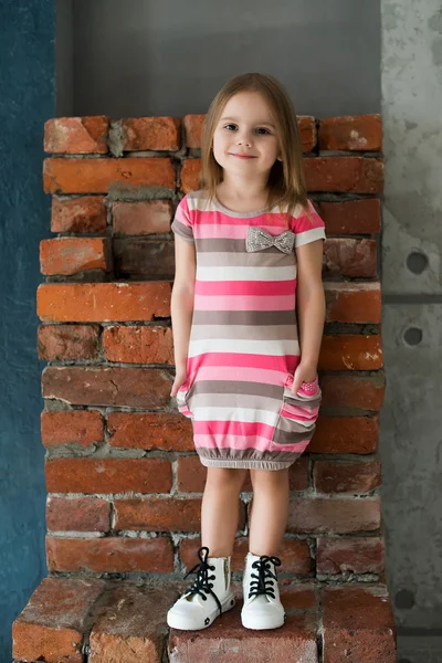 Beautiful Little girl - Russian little photo model - Striped pink dress and sneakers - Smile - Tikhomirova Veronika