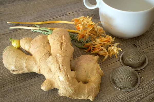 Ginger with dry herbs for tisane, hot drink