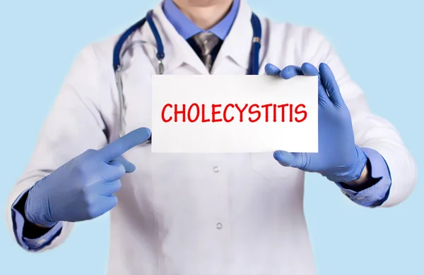 Doctor keeps a card with the name of the diagnosis - cholecystitis