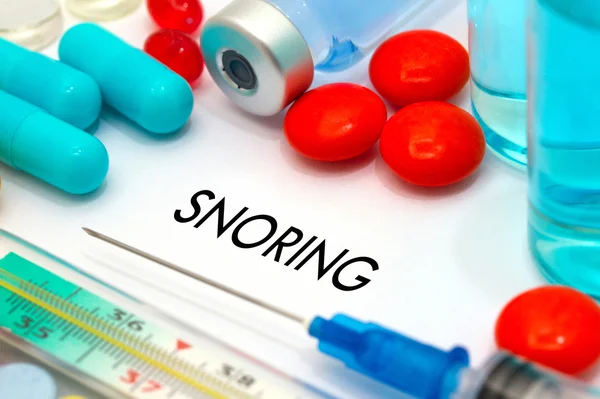 Snoring. Treatment and prevention of disease. Syringe and vaccine. Medical concept. Selective focus