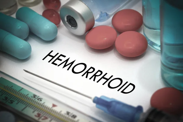 Hemorrhoid. Treatment and prevention of disease. Syringe and vaccine. Medical concept. Selective focus