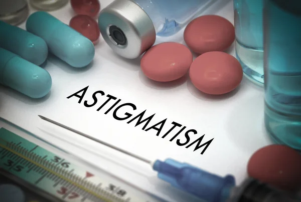 Astigmatism. Treatment and prevention of disease. Syringe and vaccine. Medical concept. Selective focus