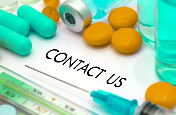 Contact us. Treatment and prevention of disease. Syringe and vaccine. Medical concept. Selective focus