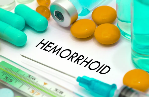 Hemorrhoid. Treatment and prevention of disease. Syringe and vaccine. Medical concept. Selective focus