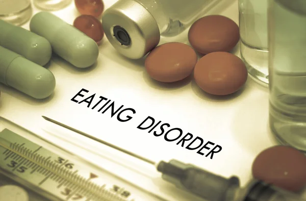 Eating disorders. Treatment and prevention of disease. Syringe and vaccine. Medical concept. Selective focus