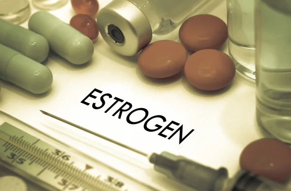 Estrogen. Treatment and prevention of disease. Syringe and vaccine. Medical concept. Selective focus