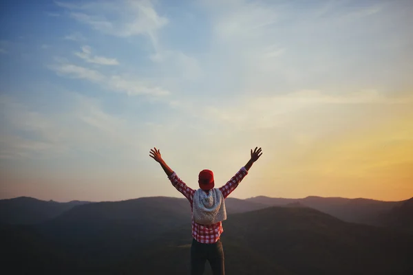 Handsome guy in Siberia, Reserve poles, Krasnoyarsk. Nature, mountains, sunset, sunrise, travel, adventure, freedom. The emotions of joy and happiness.