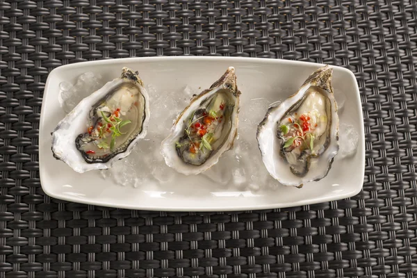 Malden oysters with chilli, ginger & rice wine vinegar