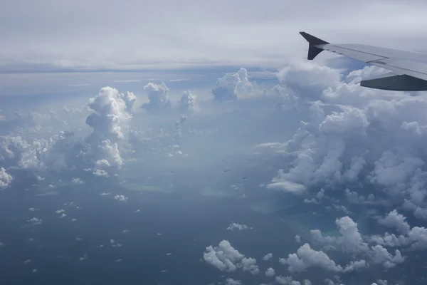 The small Maldives under a plane wing