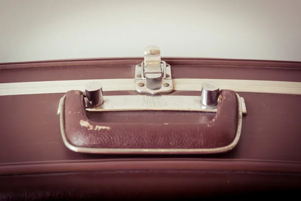 Old suitcases. Brown retro suitcase. Vintage baggage.