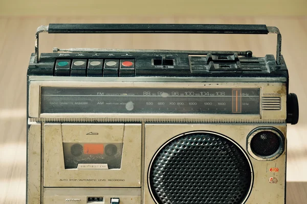 Dusty old radio with one cassette player