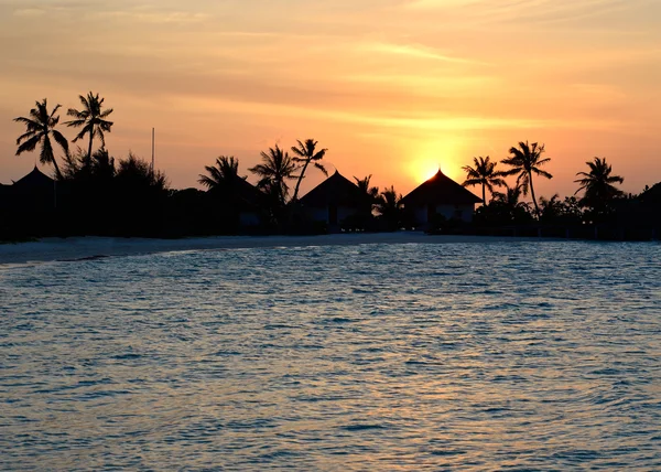 Silhouette of remote island, Maldives