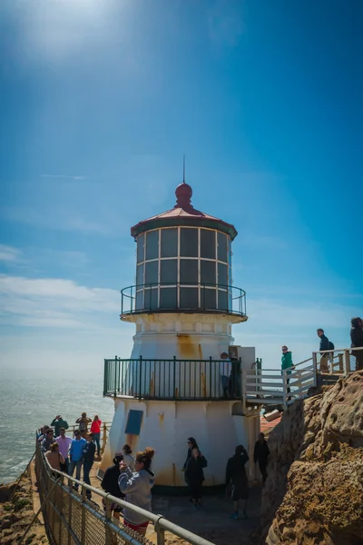 Wind blown high clouds spread as if is a design fan towards the western shore of Marin County and Point Reyes in California.