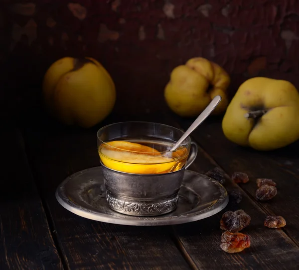 Tea with quince fruits