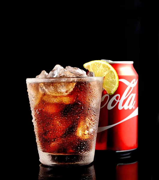 Can and glass of Coca-Cola