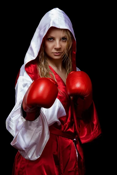 Woman in red silk bathrobe and gloves