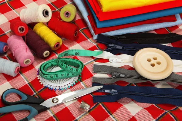 Tailor's tools on bright background