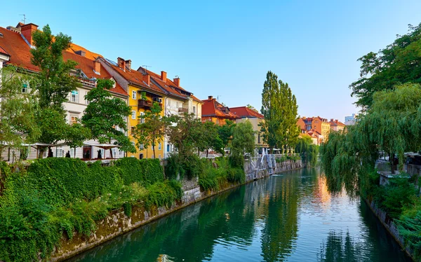 The old houses on the river bank early morning.