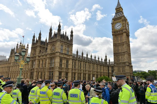 Protesters rally against public sector spending cuts following the re-election