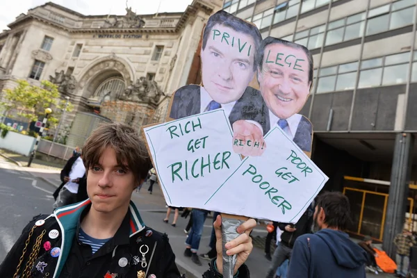 Protesters rally against public sector spending cuts following the re-election