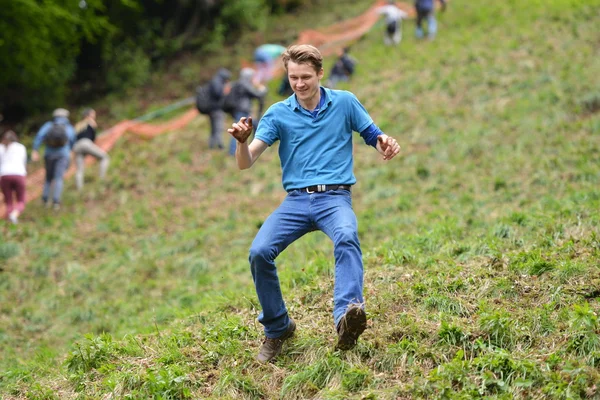 The traditional cheese rolling races in Brockworth, UK.