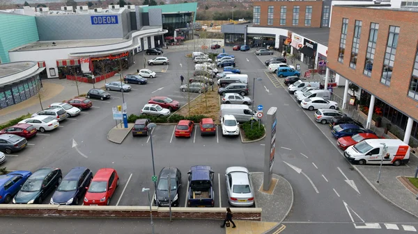 View of a car park next to a bar and restaurant entertainment complex