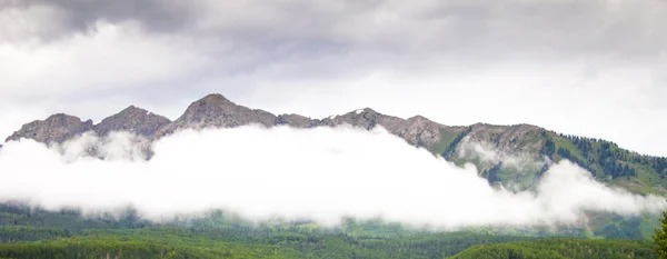 Mountain, morning scenery with clouds and mountains.