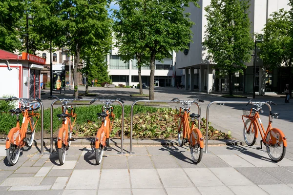 Row of city bikes for rent
