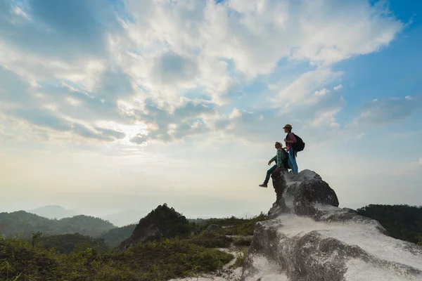 Travelers on the top of mountain