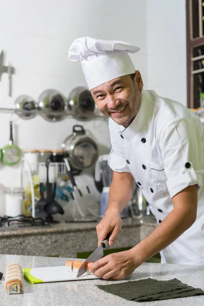 Smiling asian chef