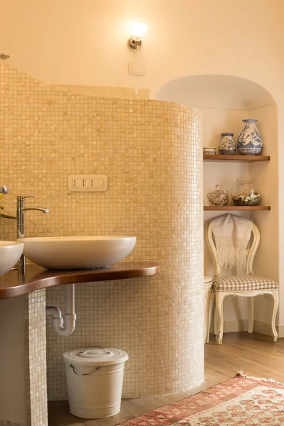 Elegant tiled bathroom in natural tones