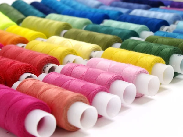 Colored threads and needles for sewing equipment