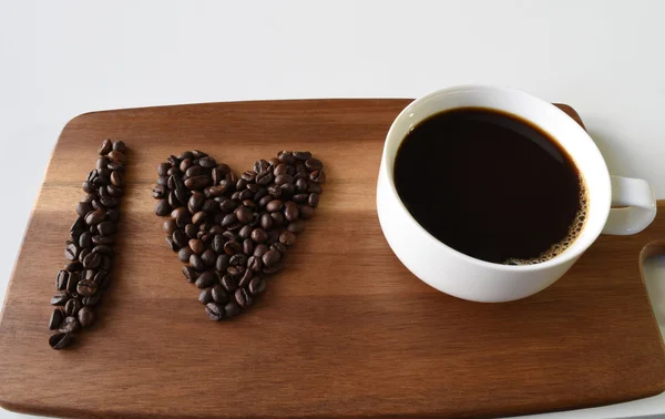 I love coffee. A cup of hot coffee with heart shape