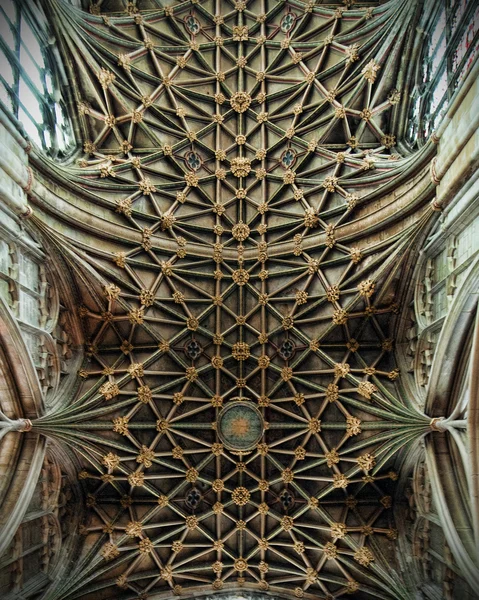 GLOUCESTER, UK - August 17, 2011: The intricate architectural detailing in the ceiling of the quire of Gloucester Cathedral is an example of the French Gothic \