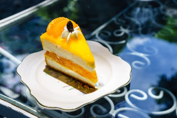 Orange shortcake in outdoor coffee shop