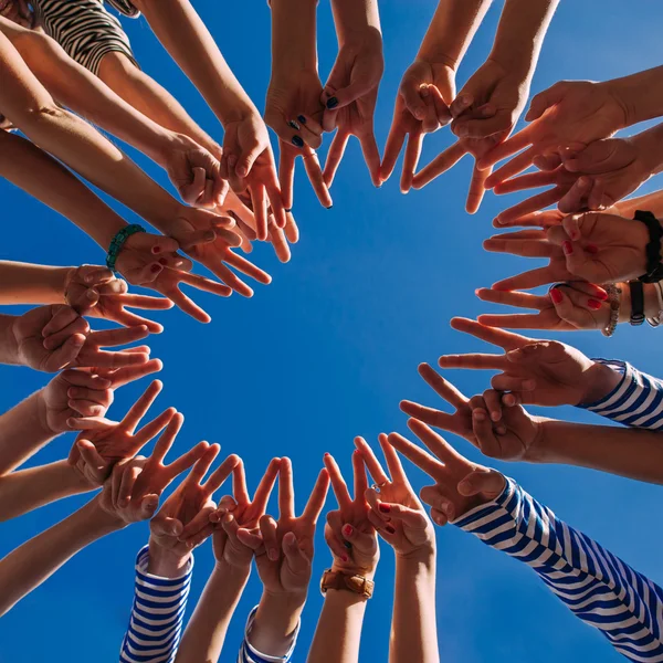 Hands forming a circle