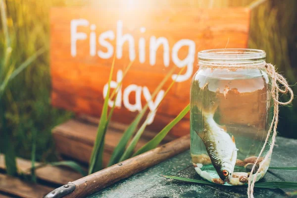 Small fish in a glass jar