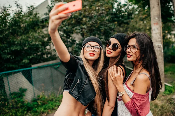 Three beautiful girls having fun