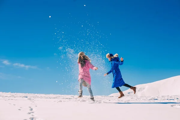 Two young girls having fun