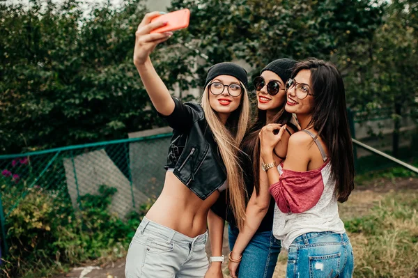 Three beautiful girls having fun