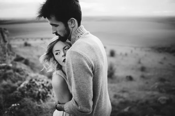 Passionate young couple in mountains