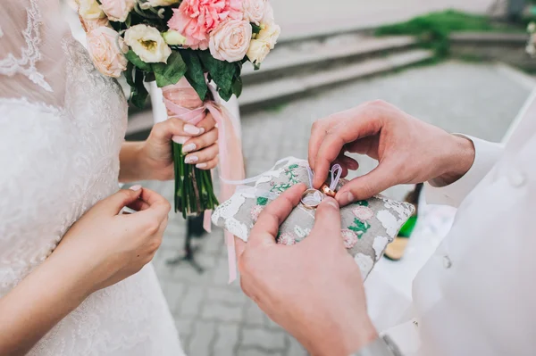 Young married couple hands