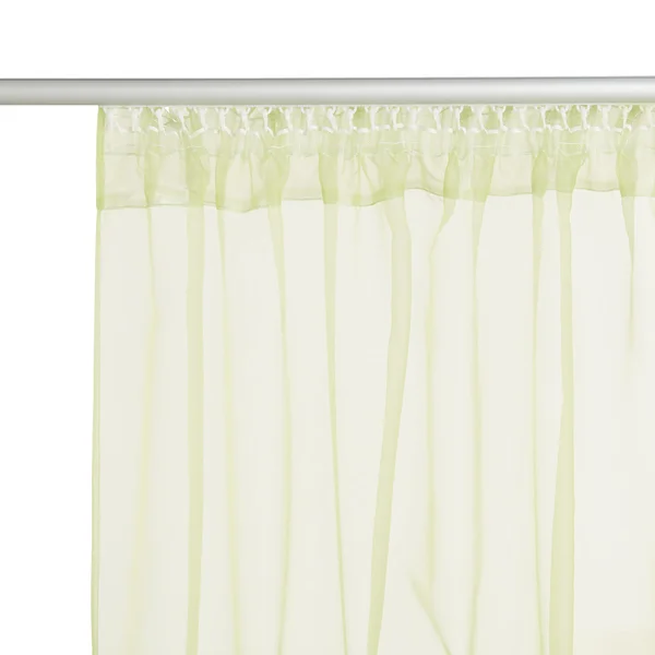 Fragment of  the light  green translucent organza  curtain with mount.