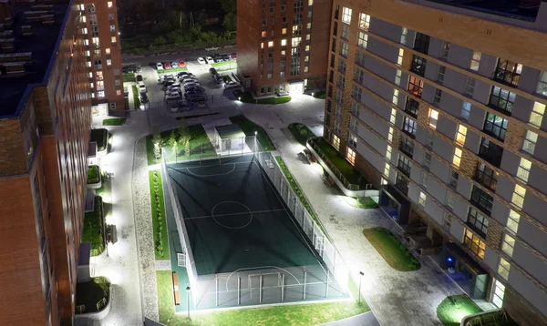 Football court with lighting in the yard