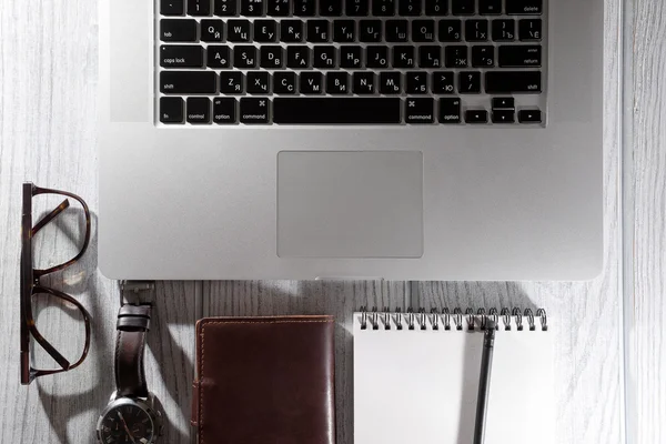 Computer glasses and telephone on the desk