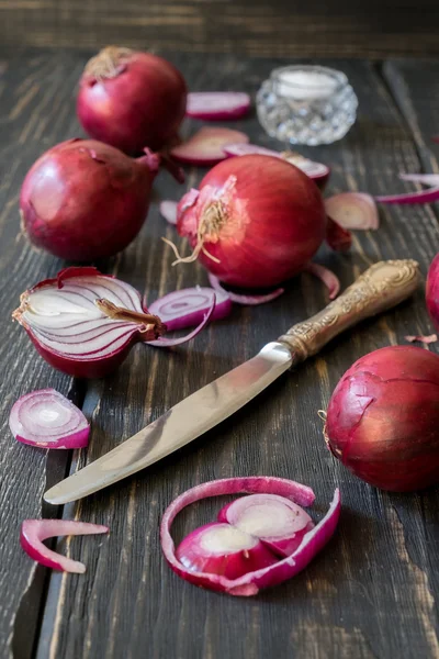 Red onions and knife